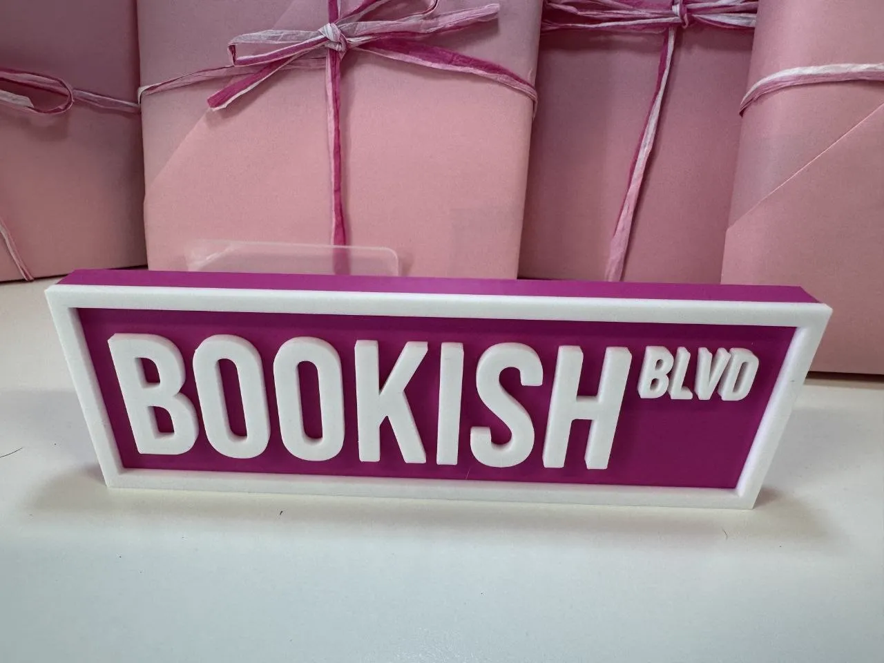 Bookish Boulevard sign with wrapped books