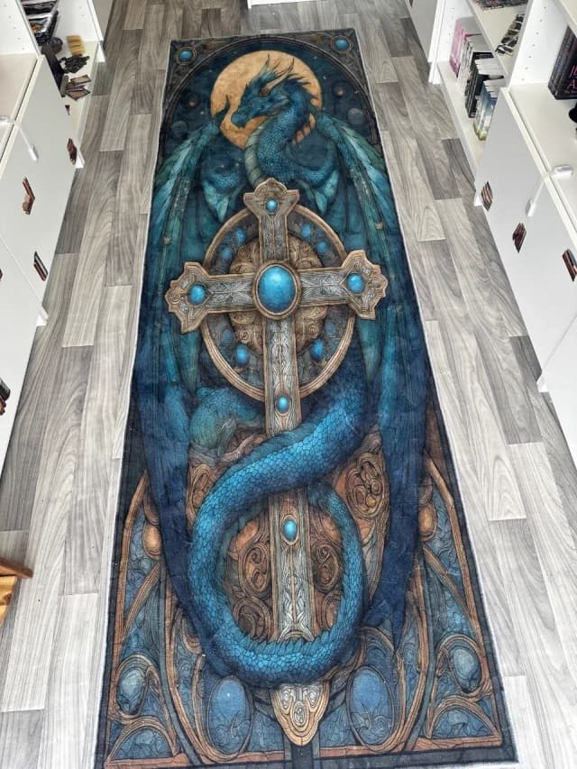 Dragon and cross floor art in the trailer